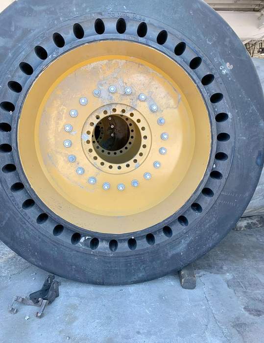 Large Industrial OTR Tire on Yellow Rim
